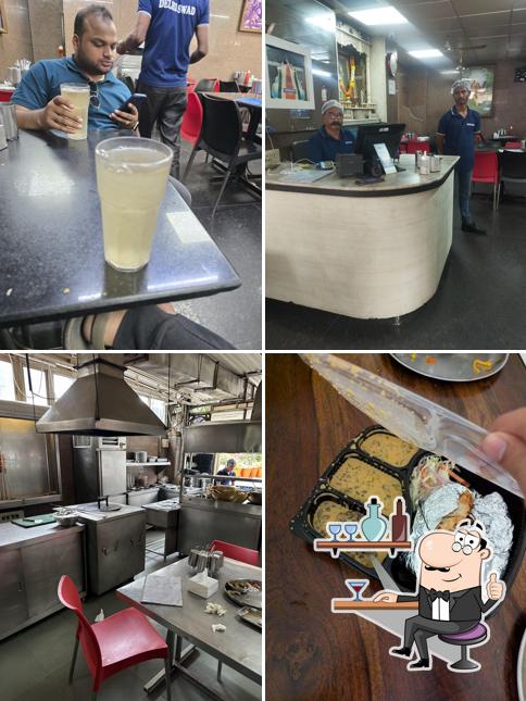 Take a seat at one of the tables at Delhi Swad