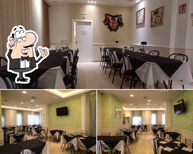 Siediti a un tavolo di Pizzeria L'Acquario