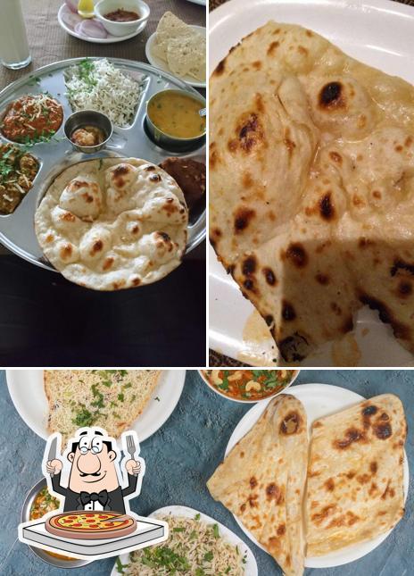 Get pizza at HANDI RESTAURANT