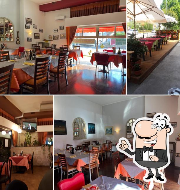 Gli interni di MAGNUM PIZZA E CUCINA Gli interni di MAGNUM PIZZA E CUCINA