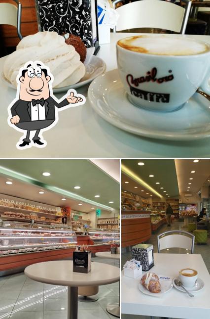 La immagine di interni e bevanda da Porato Bakery Pasticceria Caffè