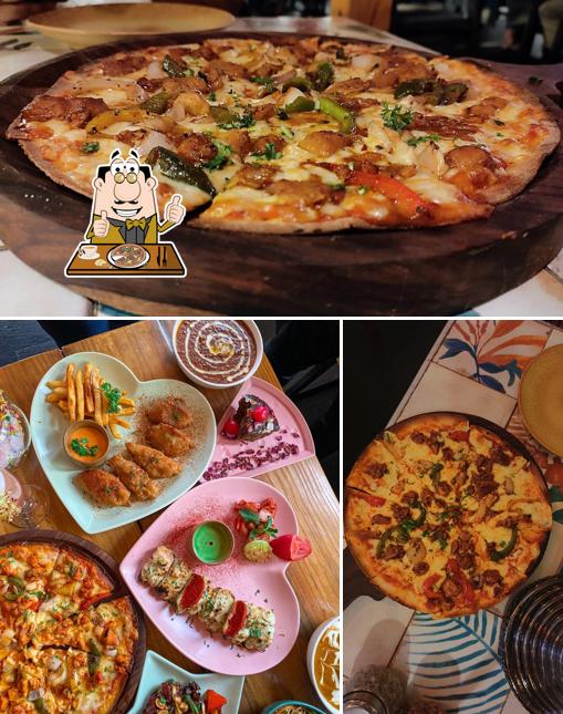Try out pizza at Vaayu