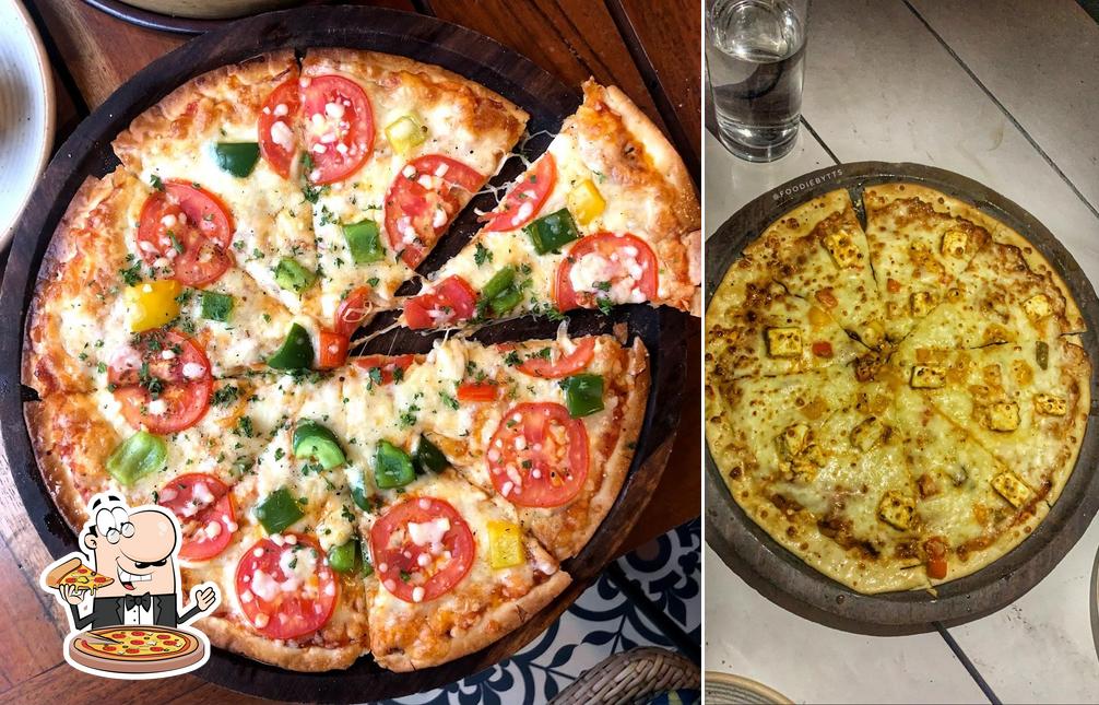 Order pizza at Moonshine Cafe and Bar, Hauz Khas Village