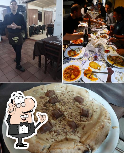 La immagine di interni e cibo da Da Luigi