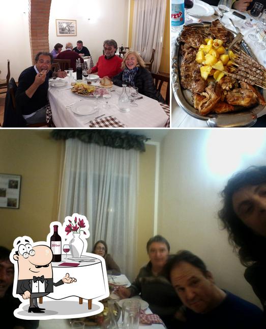 Questa è la foto che raffigura la tavolo da pranzo e cibo di Agriturismo Lidia