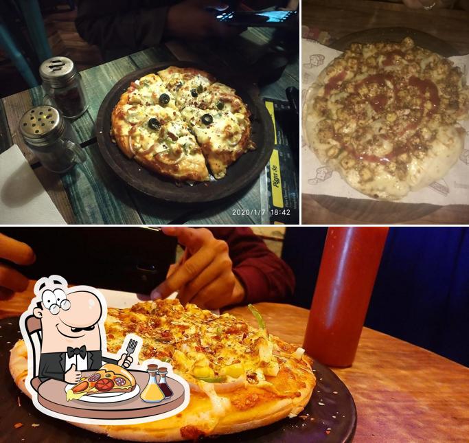 Get pizza at Cafe Adda