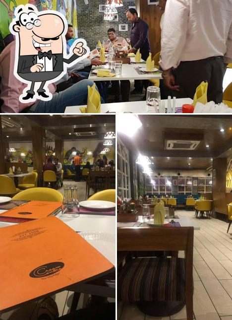 Take a seat at one of the tables at Cream Centre