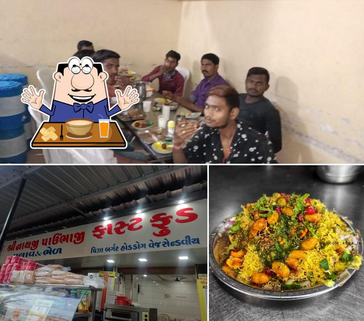 The photo of food and dining table at Shreenathji Pavbhaji - Bhel