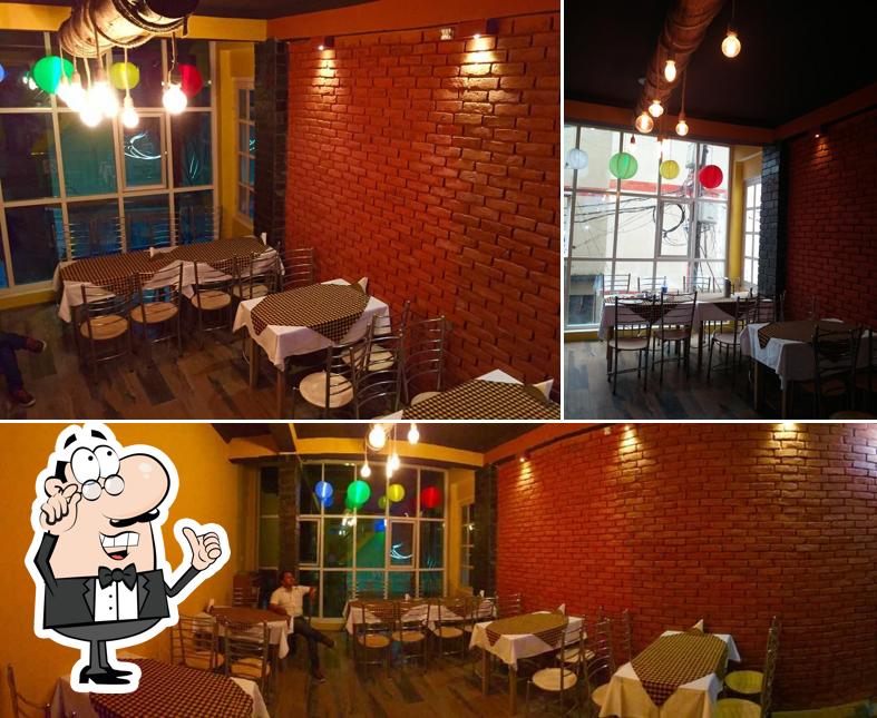 Take a seat at one of the tables at Baba's Restaurant