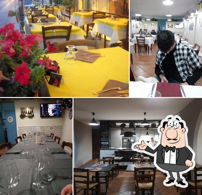 Siediti a un tavolo di Ristorante Gallo D'Oro