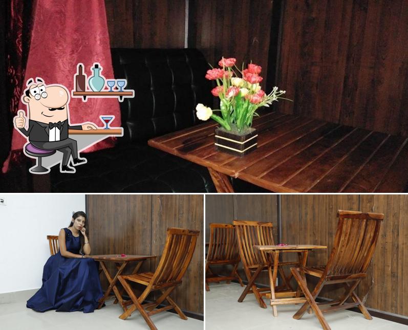 Take a seat at one of the tables at Omkar Group - Lifestyle of