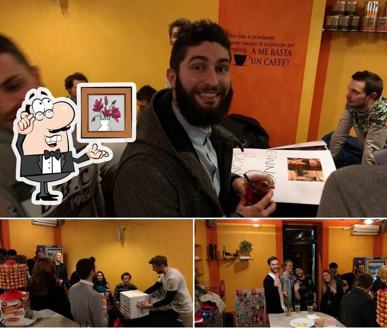 Dai un'occhiata agli interni di Cafè Del Centro