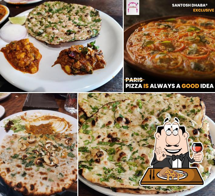 Get pizza at Santosh Dhaba Exclusive