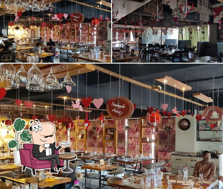 Take a seat at one of the tables at CookBook Cafe