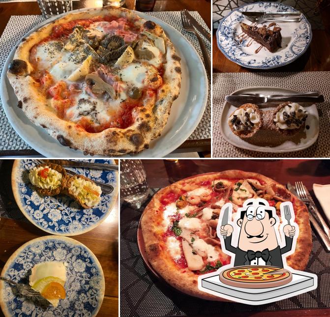 A Al Caminetto Ristorante Pizzeria, puoi prenderti una bella pizza