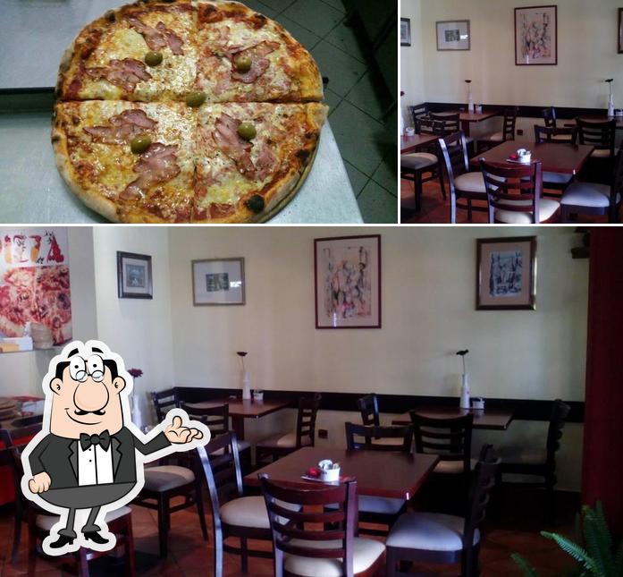 Guarda la foto che presenta la interni e pizza di Čuki Grill