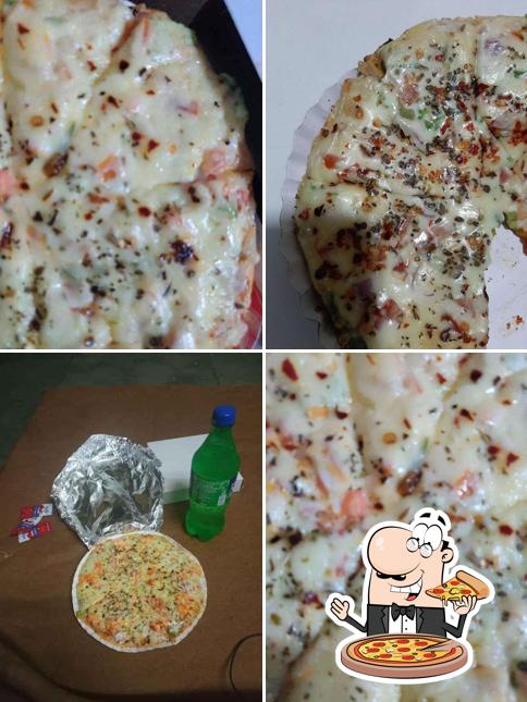 Pick pizza at Sanjay Vegetarian Corner and juce Center