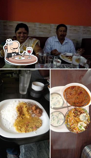 Among different things one can find food and dining table at 7 Eleven Restaurant