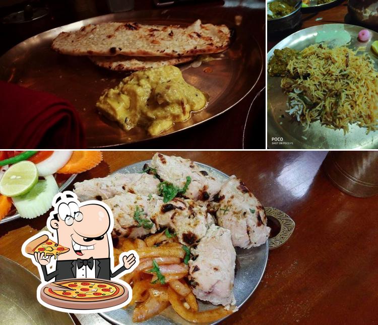 Pick pizza at Mirch Masala Restaurant & Bar