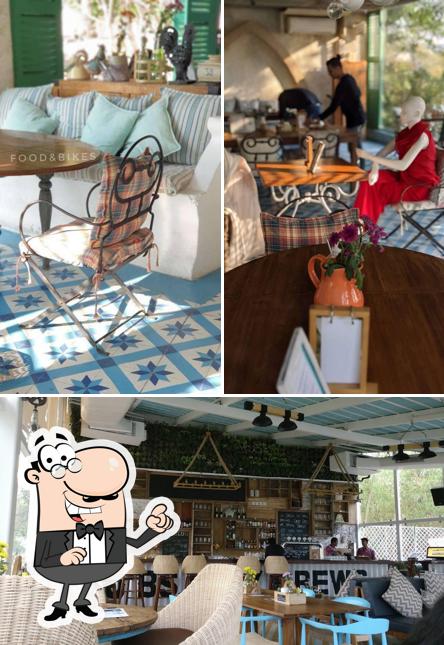 Take a seat at one of the tables at Olive Bistro & Bar