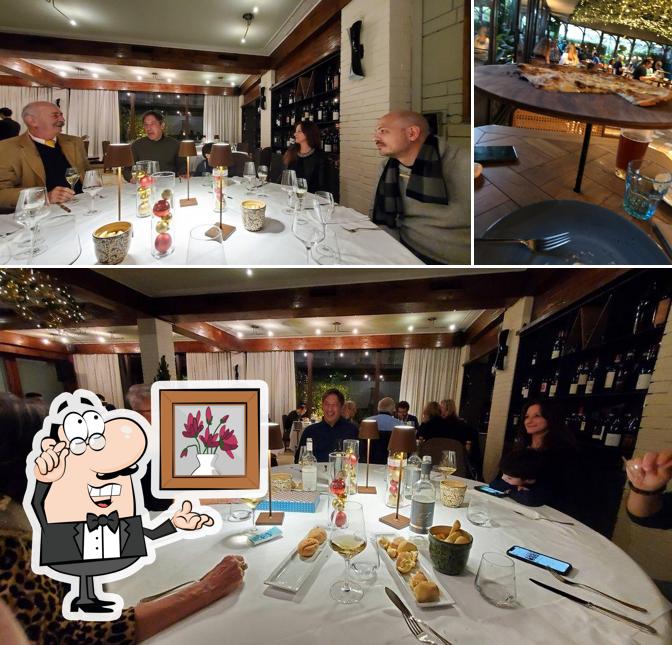 Dai un’occhiata alla foto che raffigura la interni e bevanda di Manuelina Ristorante Gourmet