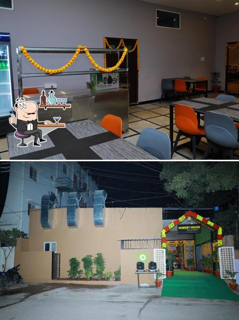 Take a seat at one of the tables at Hungry House Restaurant