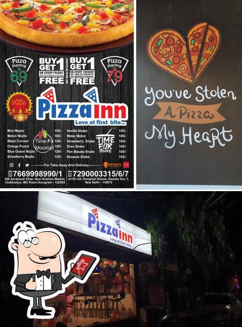 The exterior of Pizza Inn