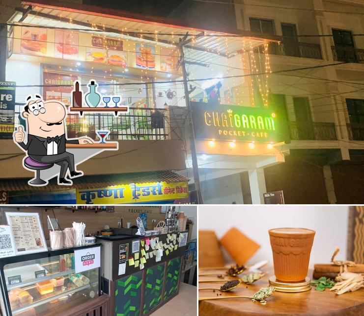 Check out the image showing interior and beverage at CHAI GARAM CAFE [Rishikesh.]