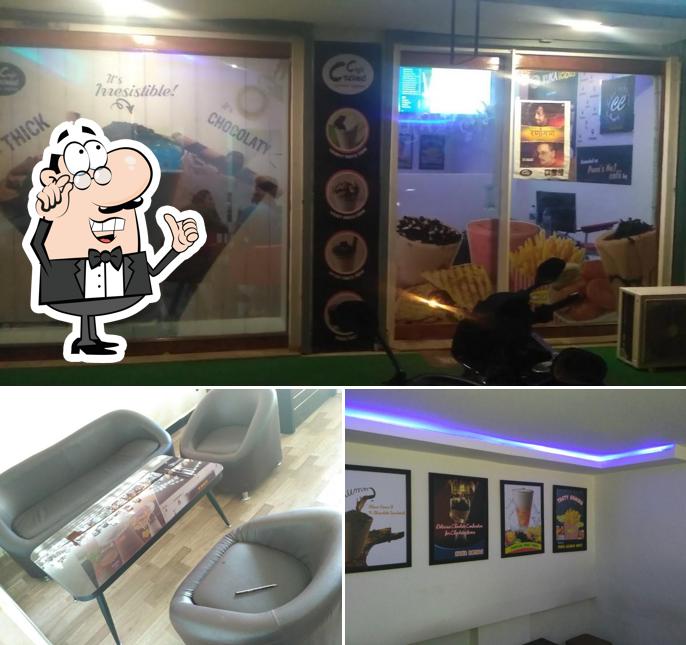 Take a seat at one of the tables at Cafe Creme.Alibag