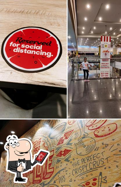 Look at the photo of Pizza Hut Hi-Lite Mall, Calicut
