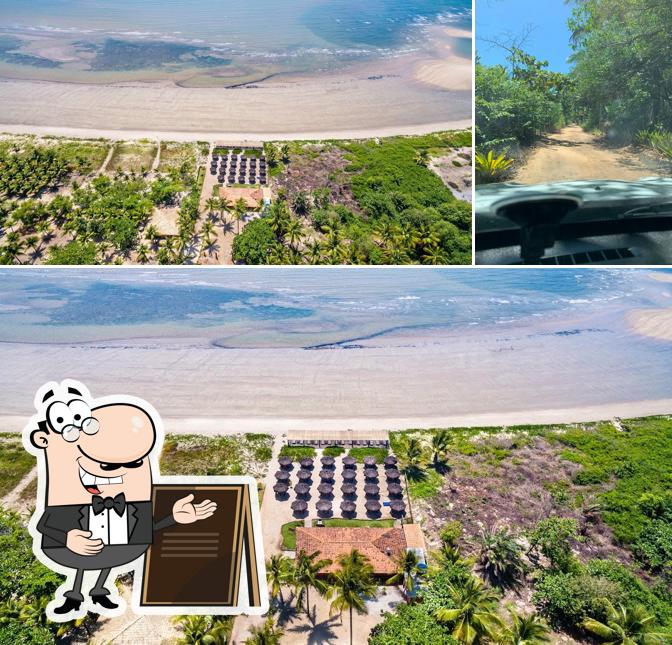 Você pode espairecer no na área externa do Maroca Praia Restaurante