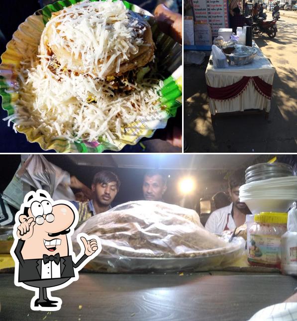 Take a look at the picture displaying interior and food at Mohan Dabeli
