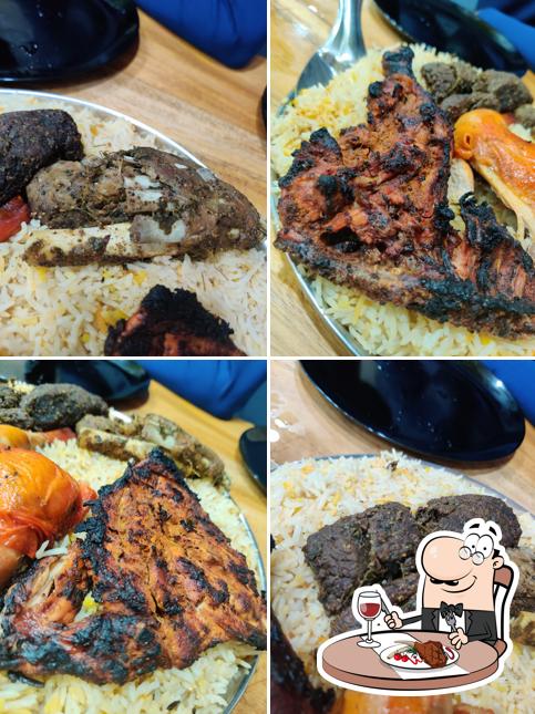 Al BADAR Kuzhimanthi serves meat dishes