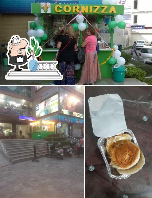 Take a look at the photo showing exterior and food at Cornizza