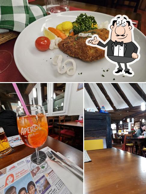 La immagine della interni e cibo di Restaurant Walliser Kanne