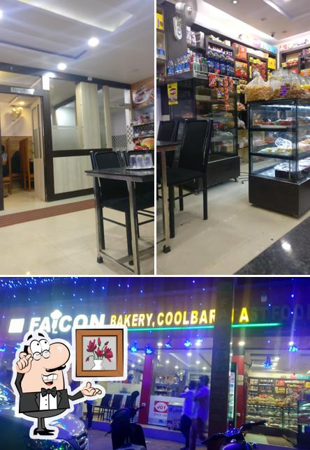 Take a seat at one of the tables at FALCON Bakery Coolbar & Fast Food