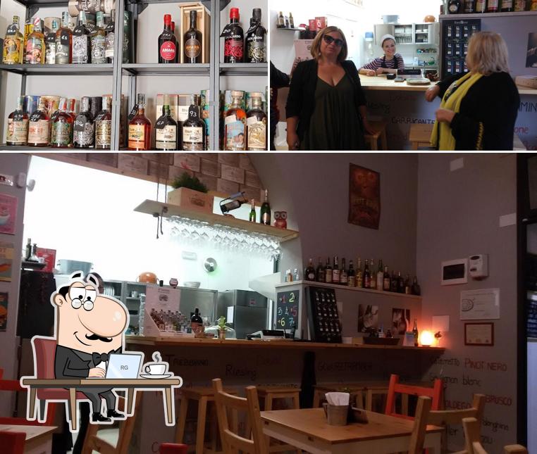 Siediti a un tavolo di Enoteca La Champagnotta