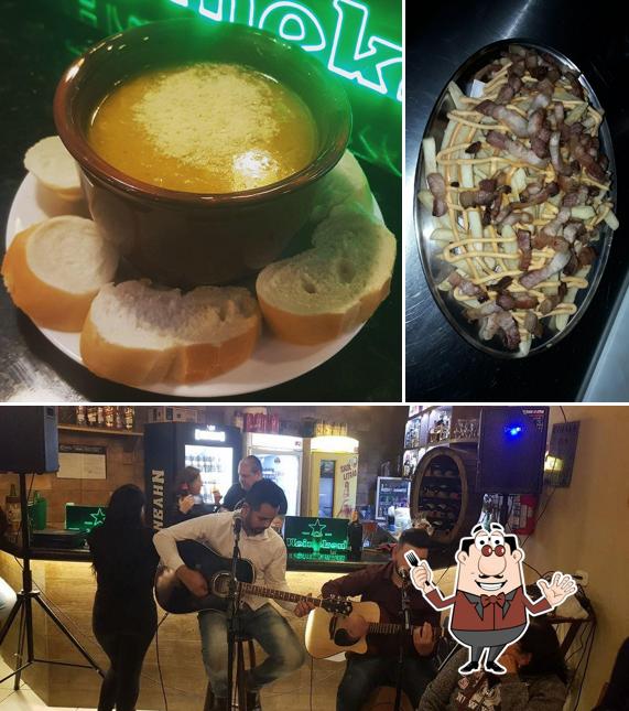 A foto da comida e interior no Espelunca Pub