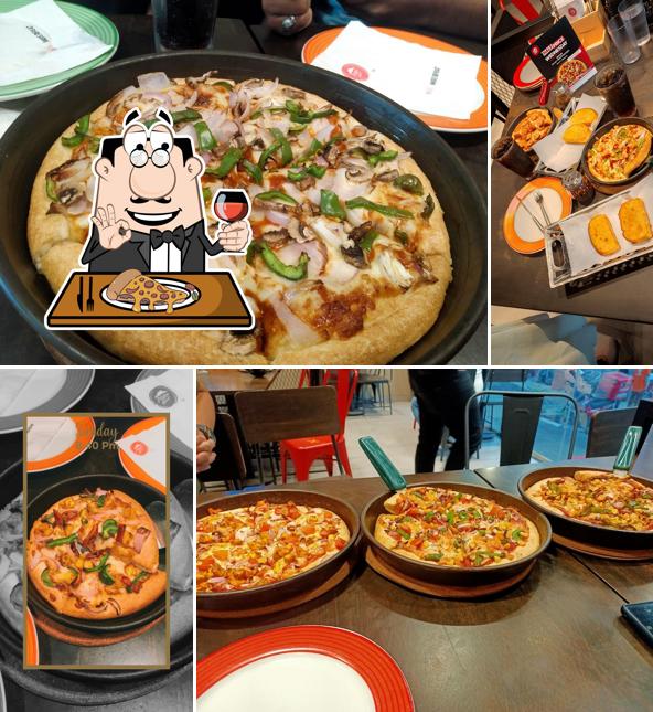 At Pizza Hut Wardhaman Nagar, Nagpur, you can try pizza