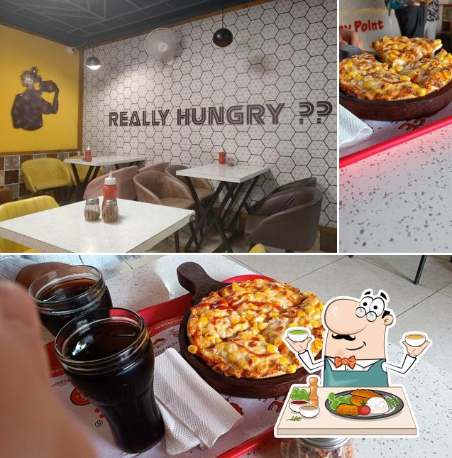 Check out the photo showing food and interior at Hungry Point
