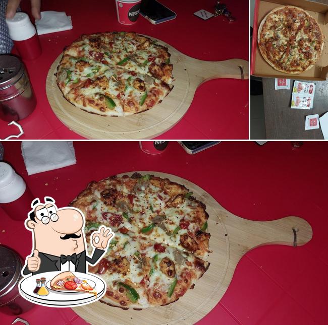 Pick pizza at Laziz Pizza