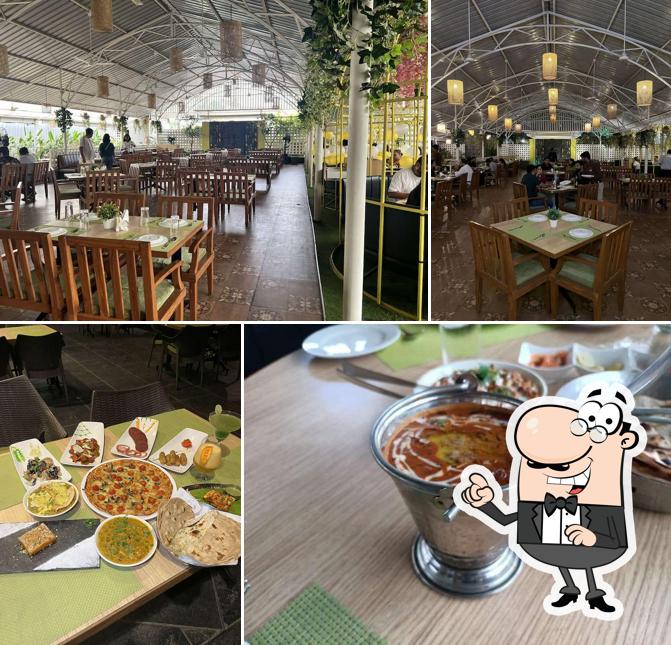 Take a seat at one of the tables at LE PARC THERGAON