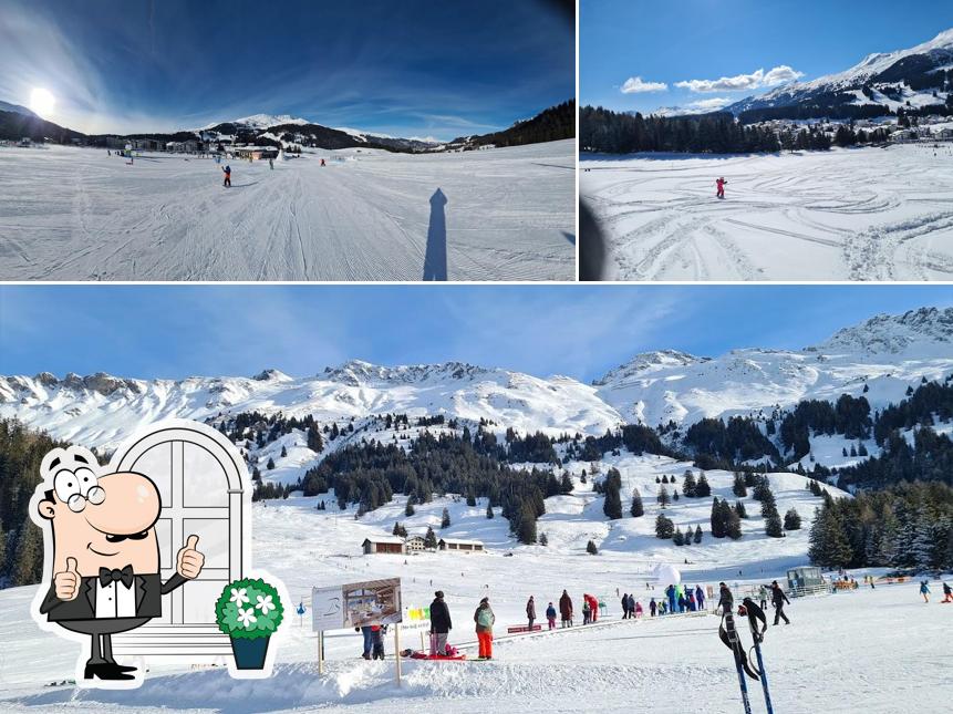 Goditi la vista dagli esterni di Swiss snow sports school Parpan