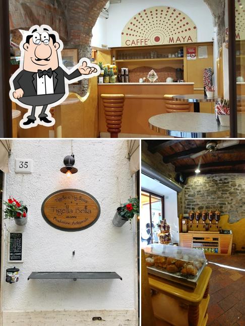 Dai un'occhiata agli interni di Caffè Maya