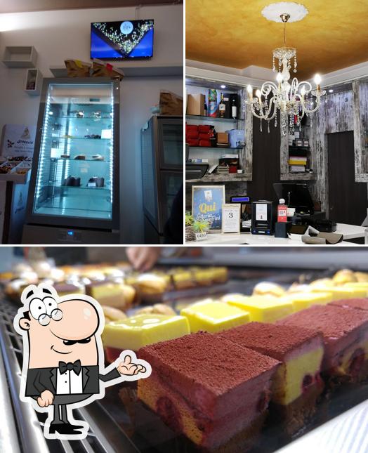 La foto di interni e torta da La Piccola Dolceria di Elena
