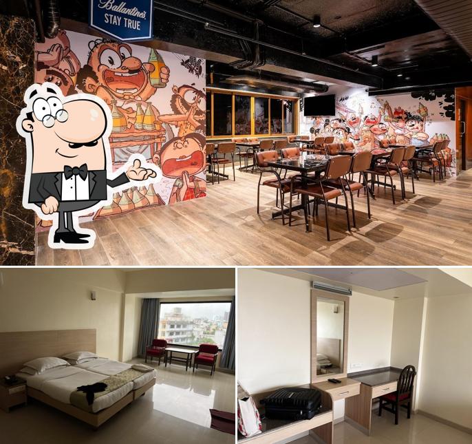 Take a seat at one of the tables at Hotel Maris