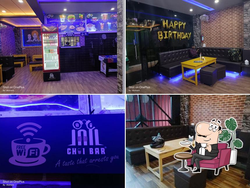Take a seat at one of the tables at Jail Chai Bar Best cafe