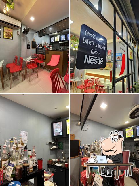 Take a seat at one of the tables at Nescafè