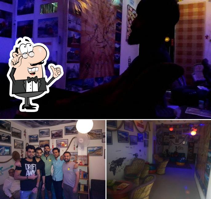 Take a seat at one of the tables at Shivaa's Travel Café