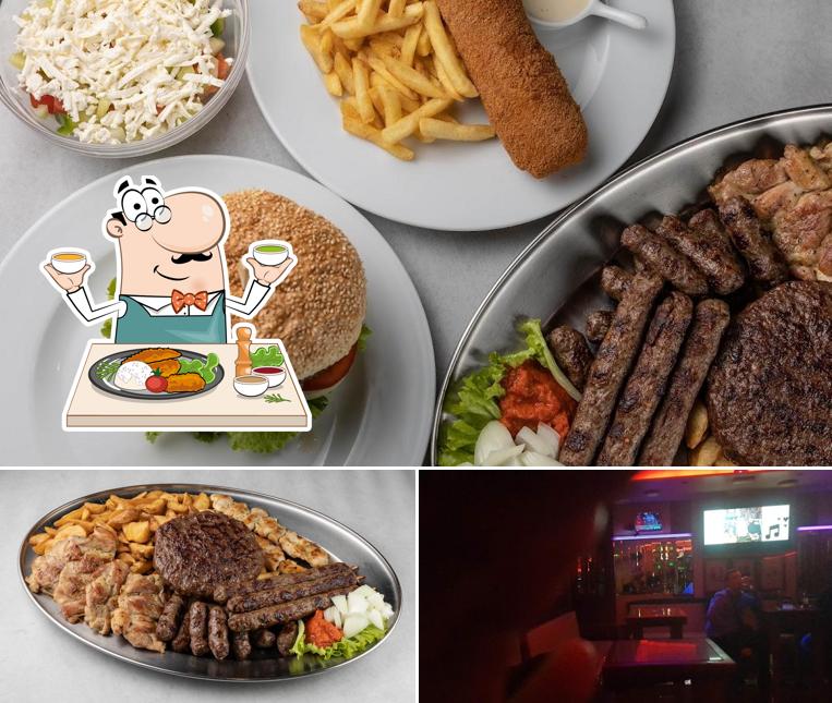 Tra le diverse cose da Club Cocktail Bar Amadeus si possono trovare la cibo e interni